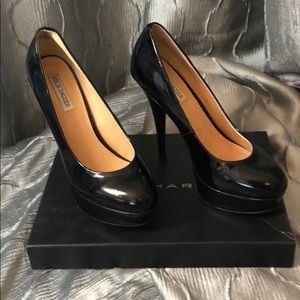 SOLD Black patent platform heels, worn once.